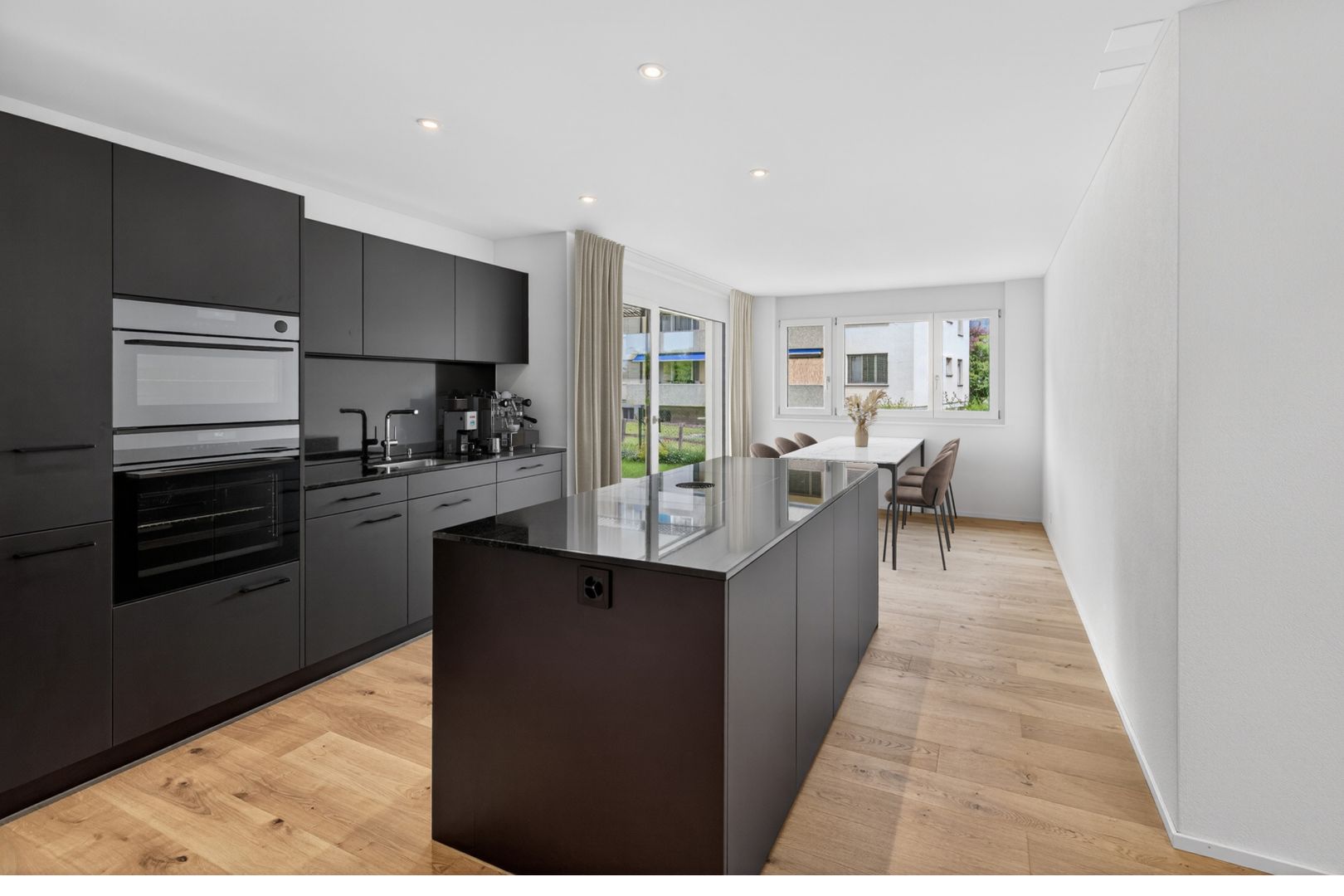 Hochwertige Neubauwohnung mit eigenem Garten an zentraler Lage - Bild 3